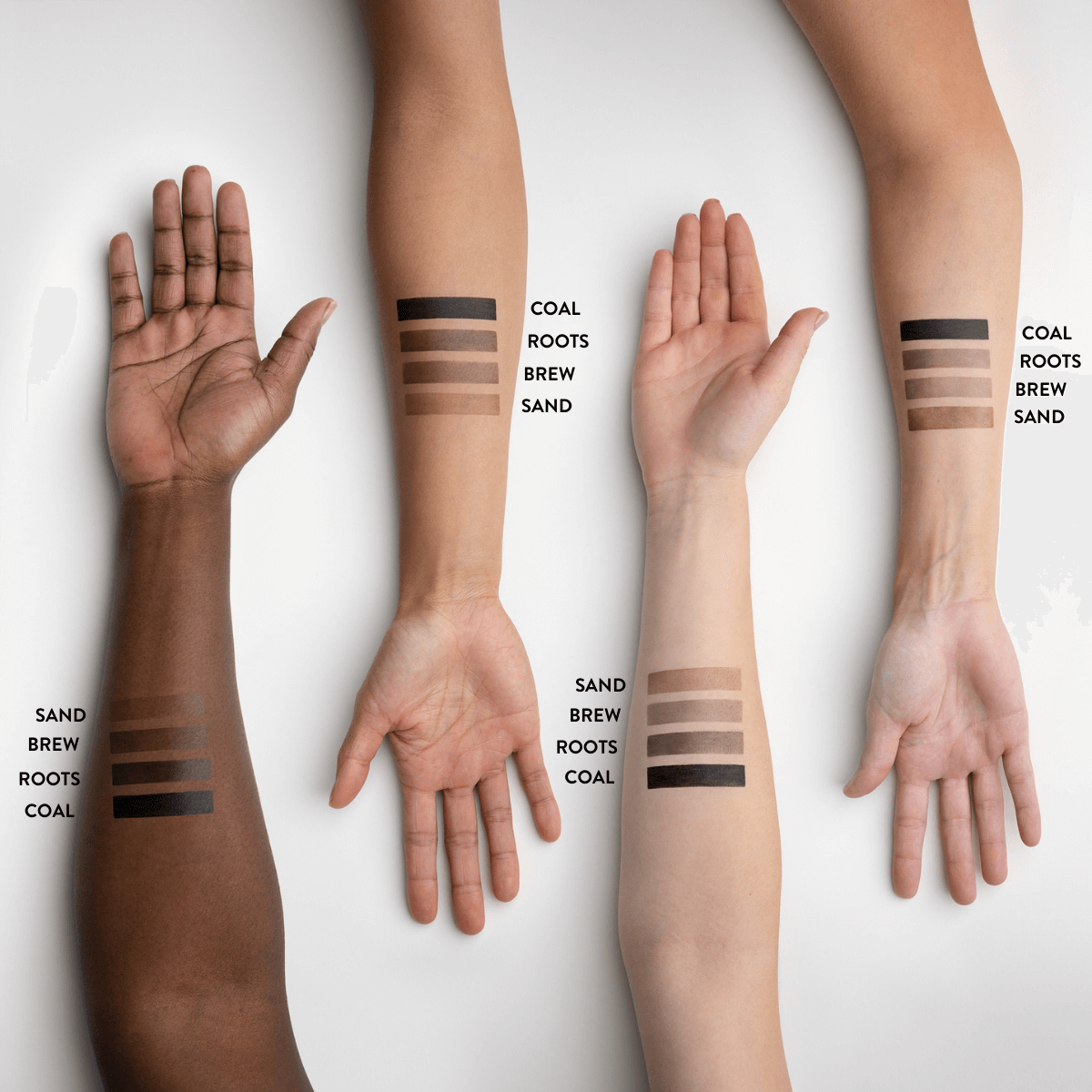 Different coloured skin arm with brow make up shades on