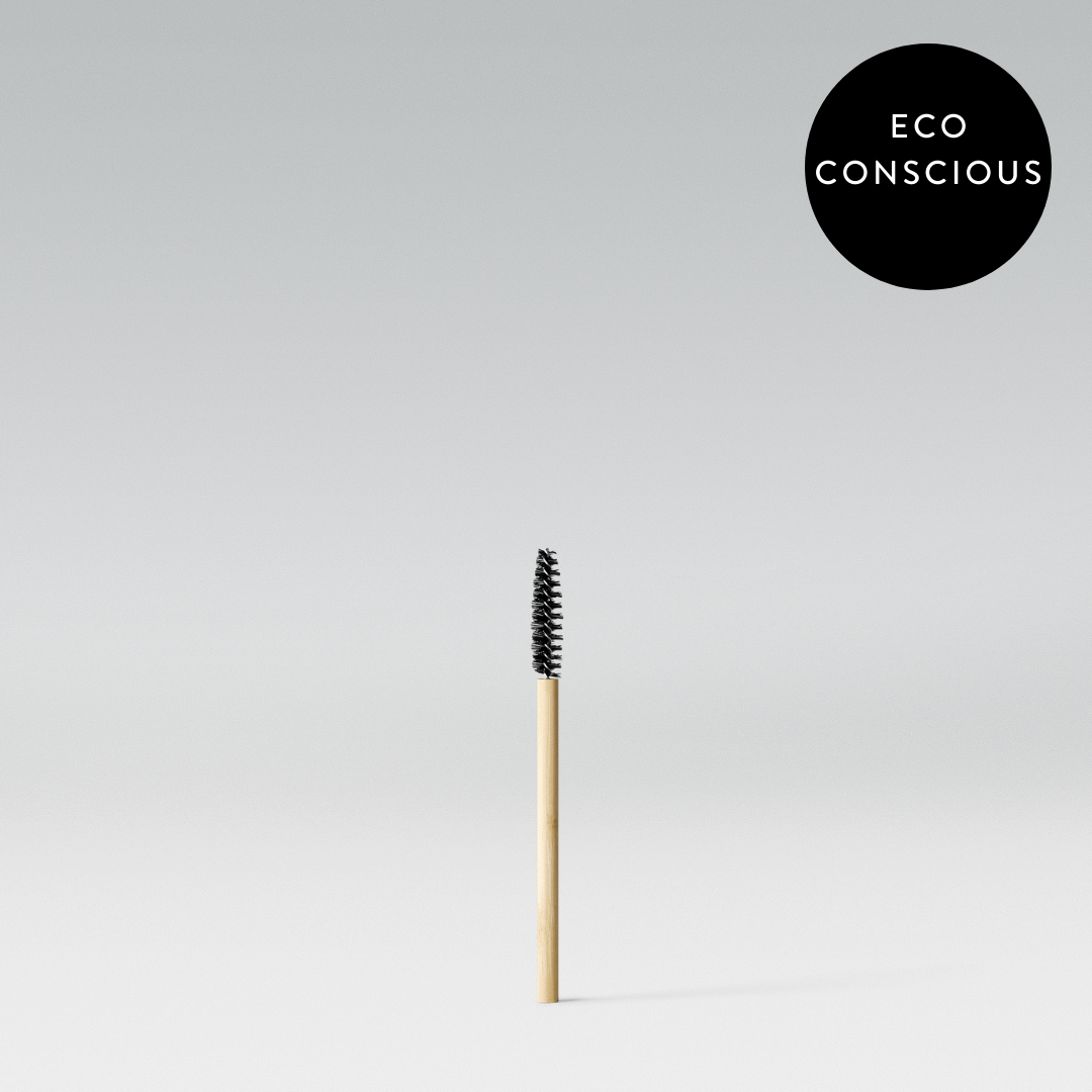 A single bamboo spoolie brush with a label in the upper right corner stating 'ECO CONSCIOUS'.